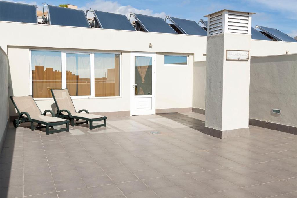 A balcony or terrace at Vistas al Mar junto a la Playa 3D