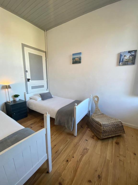 Postel nebo postele na pokoji v ubytování L'Estanquet Bed and Breakfast pdj offert