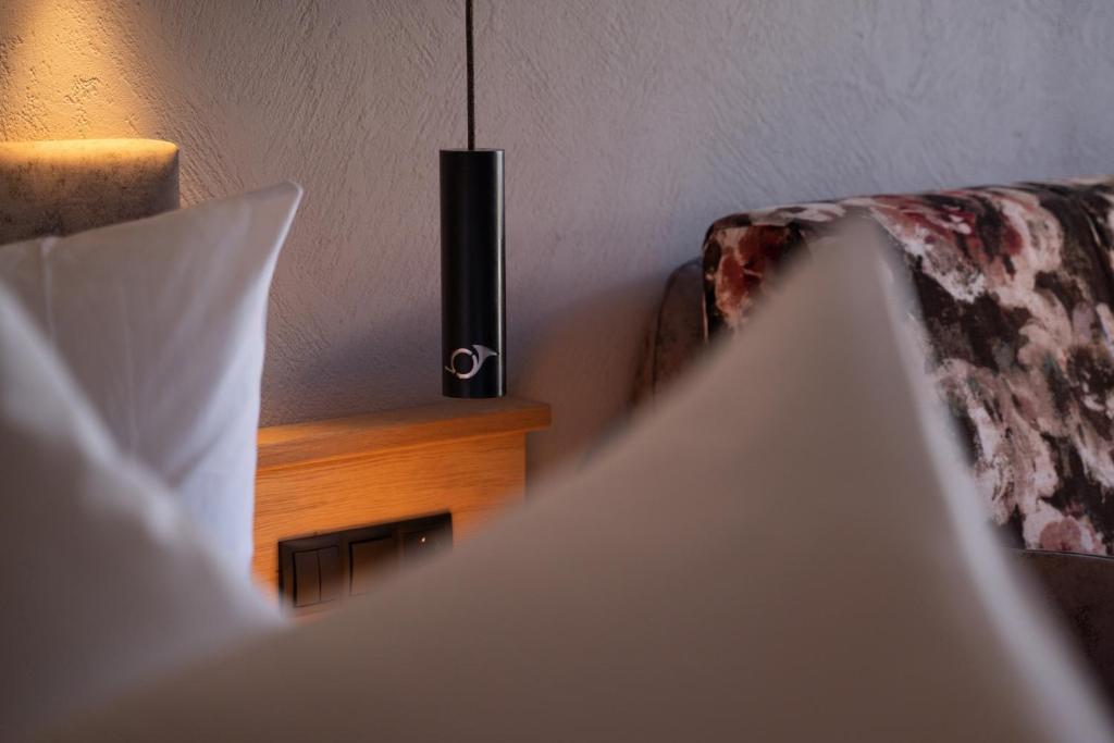 Postel nebo postele na pokoji v ubytování Hotel Post