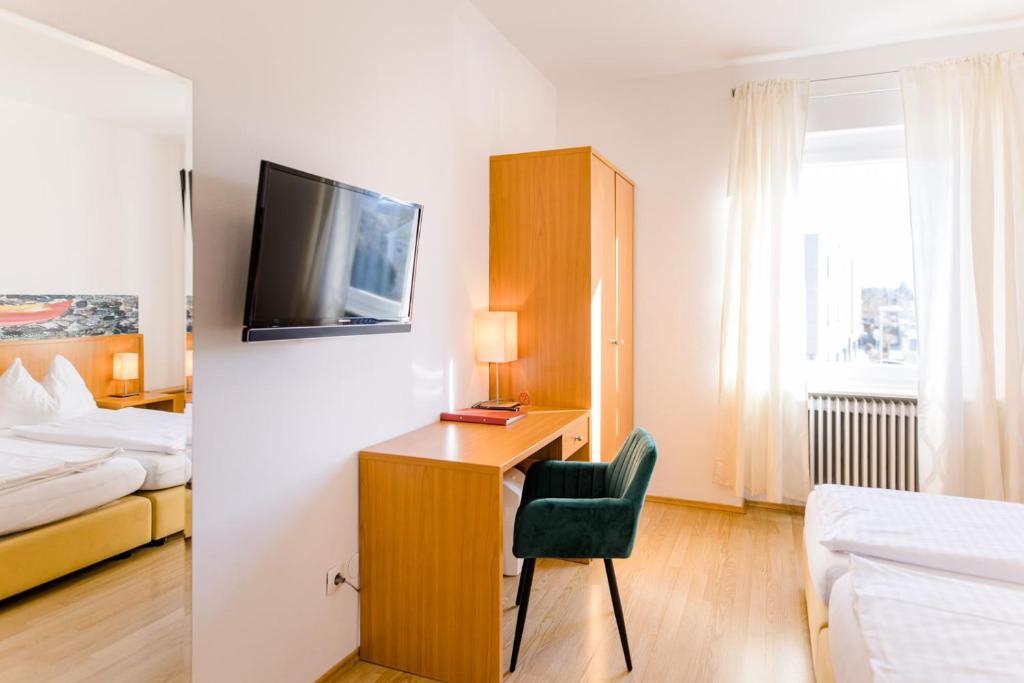 Postel nebo postele na pokoji v ubytování Hotel Restaurant Römerhof