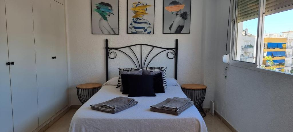 Łóżko lub łóżka w pokoju w obiekcie old town Marbella