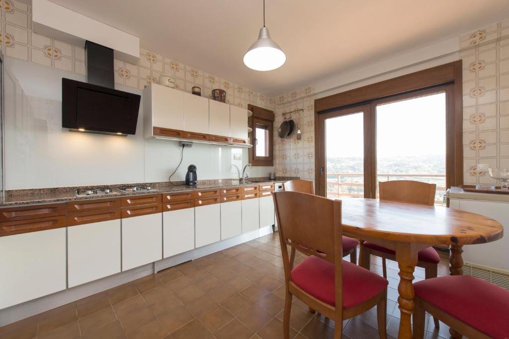 Kuchyň nebo kuchyňský kout v ubytování Casa de Sabela