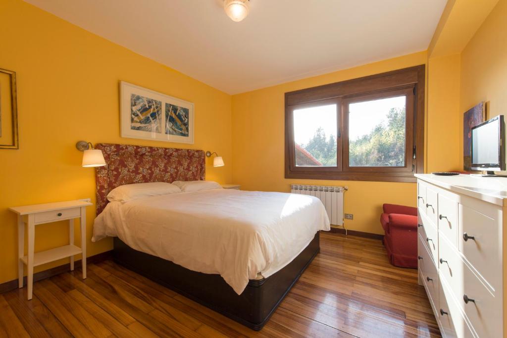 Postel nebo postele na pokoji v ubytování Casa de Sabela