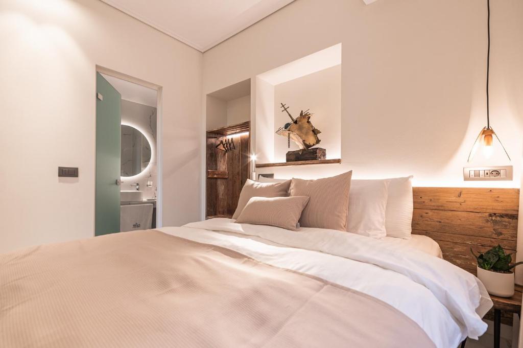 Posteľ alebo postele v izbe v ubytovaní Silo Luxury Rooms