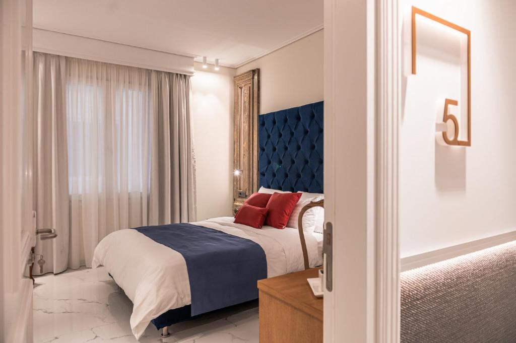 Posteľ alebo postele v izbe v ubytovaní Silo Luxury Rooms