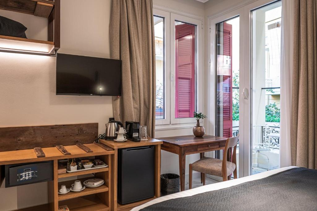 Televízia a/alebo spoločenská miestnosť v ubytovaní Silo Luxury Rooms