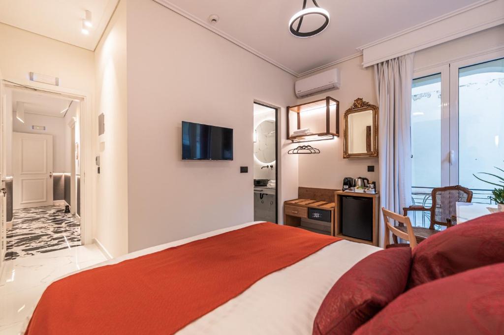 Televízia a/alebo spoločenská miestnosť v ubytovaní Silo Luxury Rooms