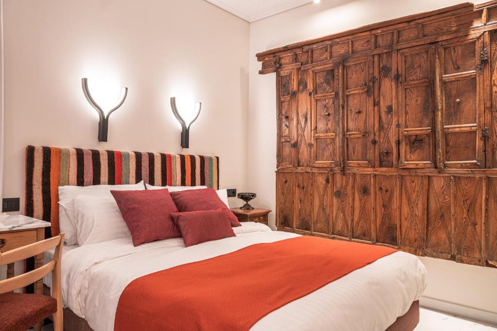 Posteľ alebo postele v izbe v ubytovaní Silo Luxury Rooms