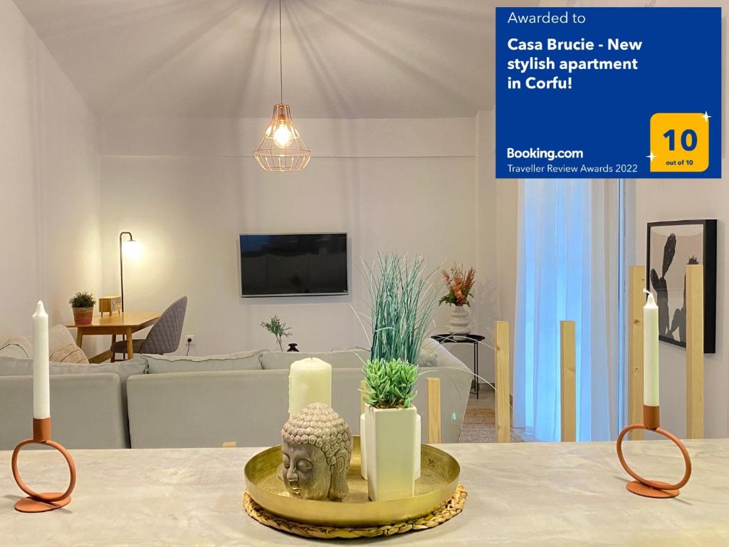Una televisión o centro de entretenimiento en Casa Brucie - New stylish apartment in Corfu!