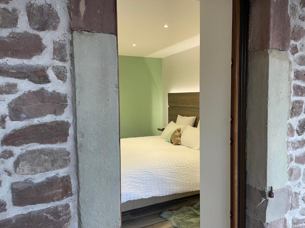 Postel nebo postele na pokoji v ubytování Les chambres d'à côté