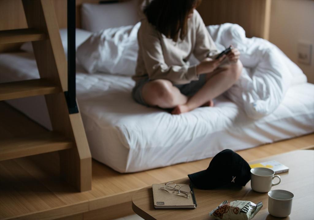 Postel nebo postele na pokoji v ubytování fav Hida Takayama