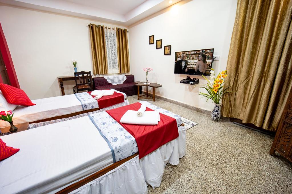 Postel nebo postele na pokoji v ubytování Celso's Home Stay