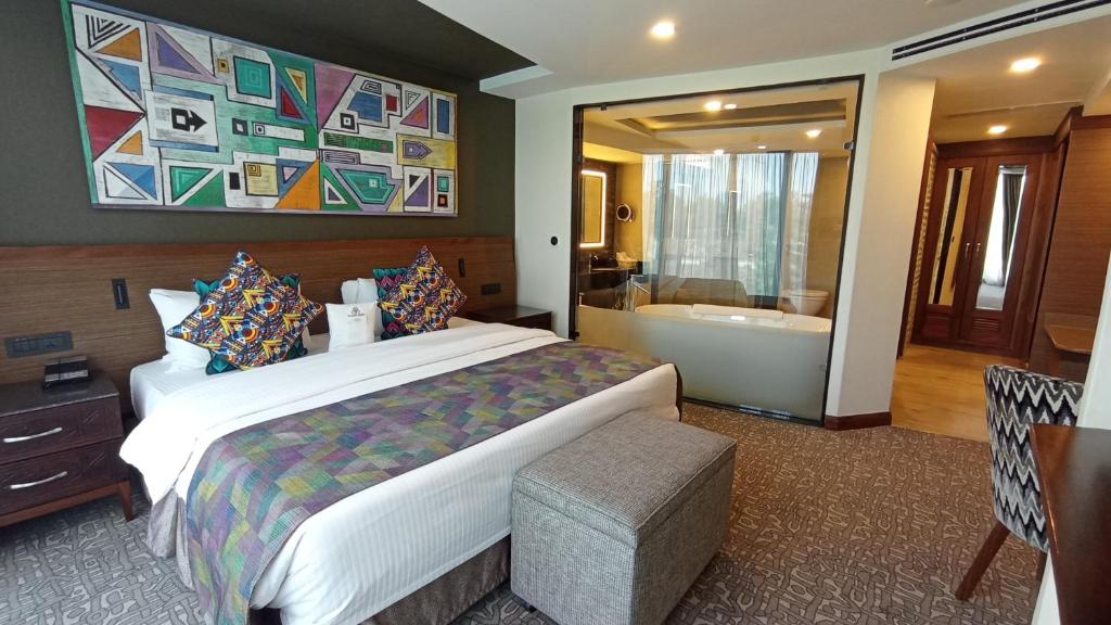 Postel nebo postele na pokoji v ubytování Sarova Panafric Hotel
