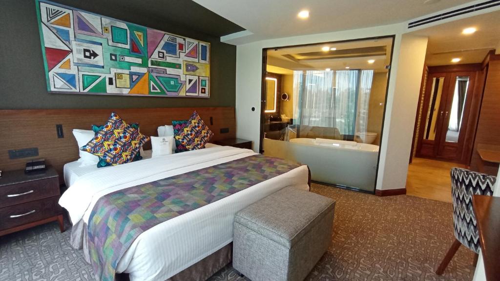 Postel nebo postele na pokoji v ubytování Sarova Panafric Hotel