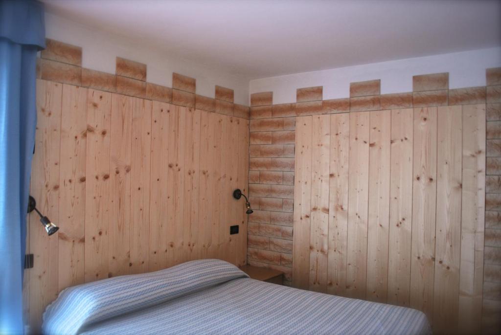 Letto o letti in una camera di Maso La Vecchia Quercia