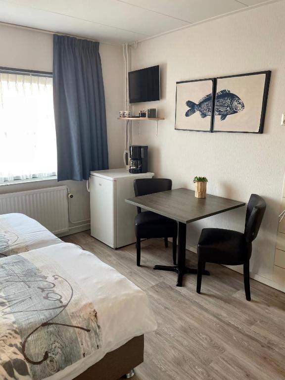 Postel nebo postele na pokoji v ubytování Pension Brinkvis