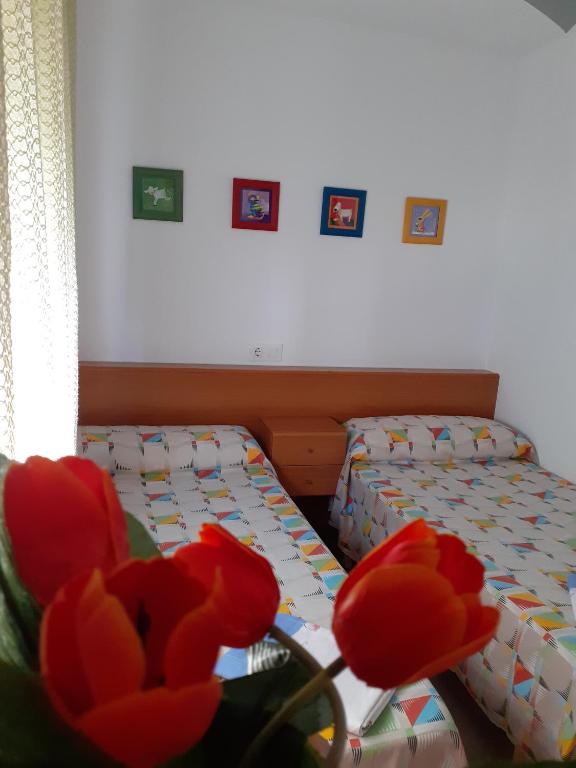 Postel nebo postele na pokoji v ubytování Apartamento Nuria Los Abanicos