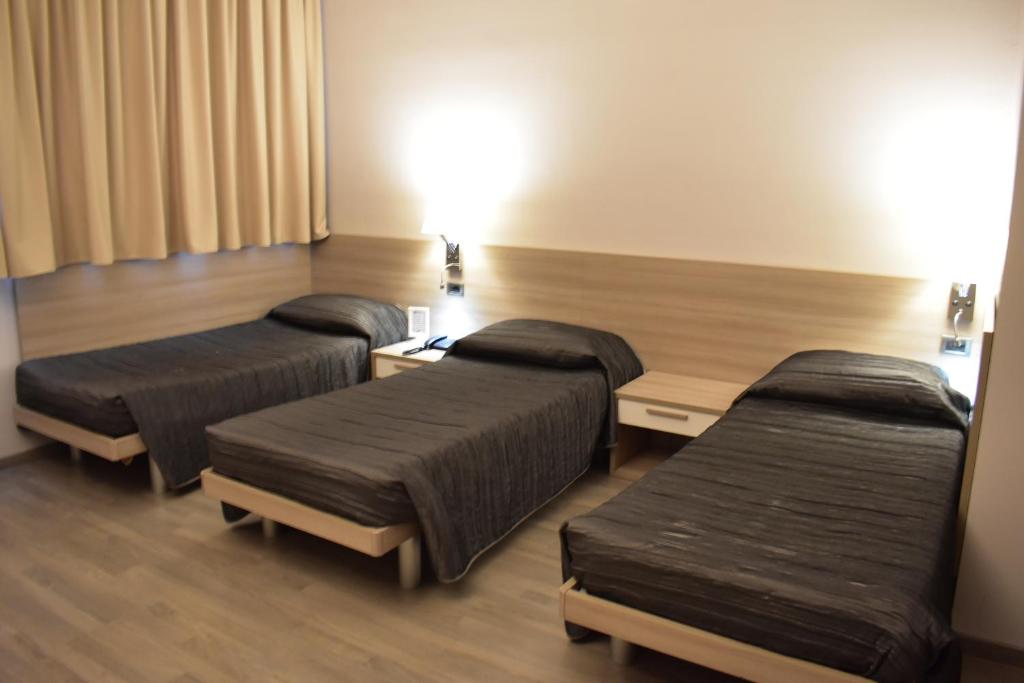 Posteľ alebo postele v izbe v ubytovaní Hotel Meuble' Atlantic