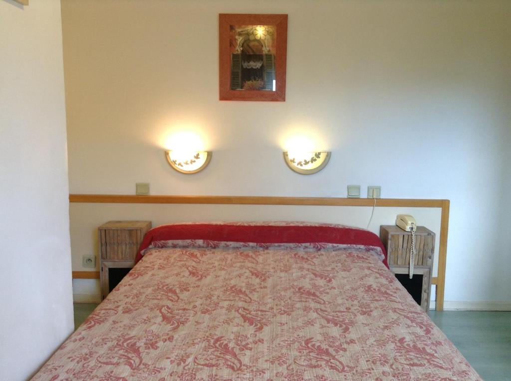 Postel nebo postele na pokoji v ubytování Hotel Acapulco