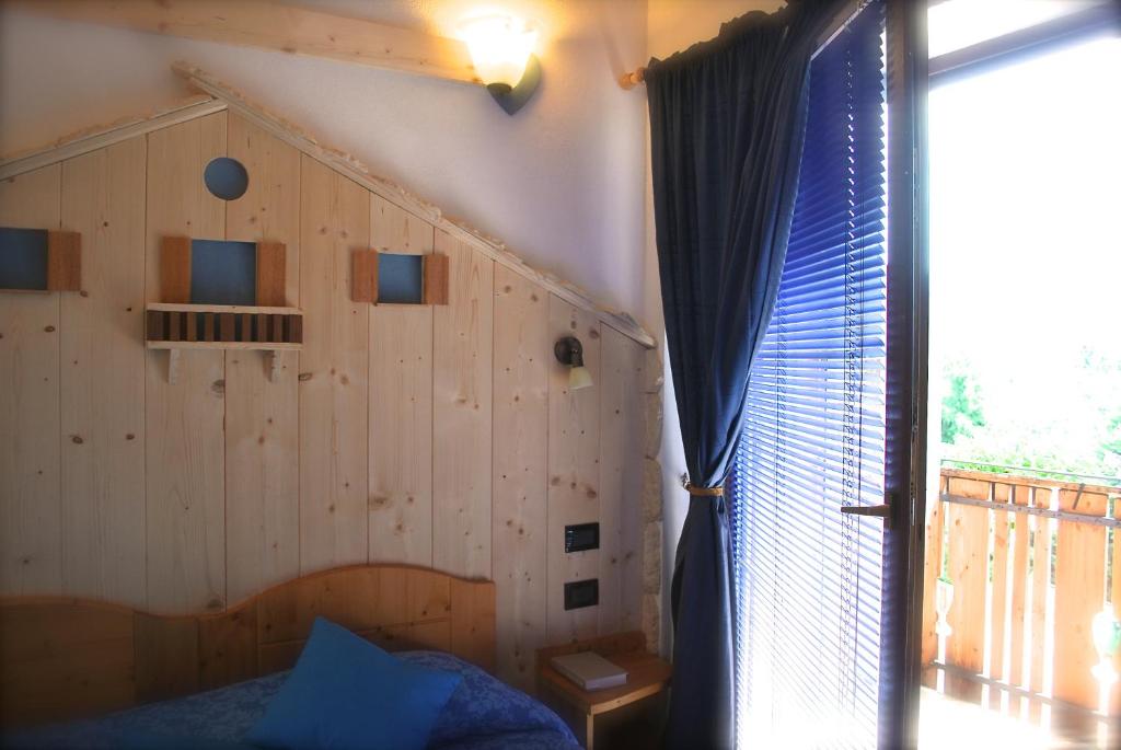 Letto o letti in una camera di Maso La Vecchia Quercia