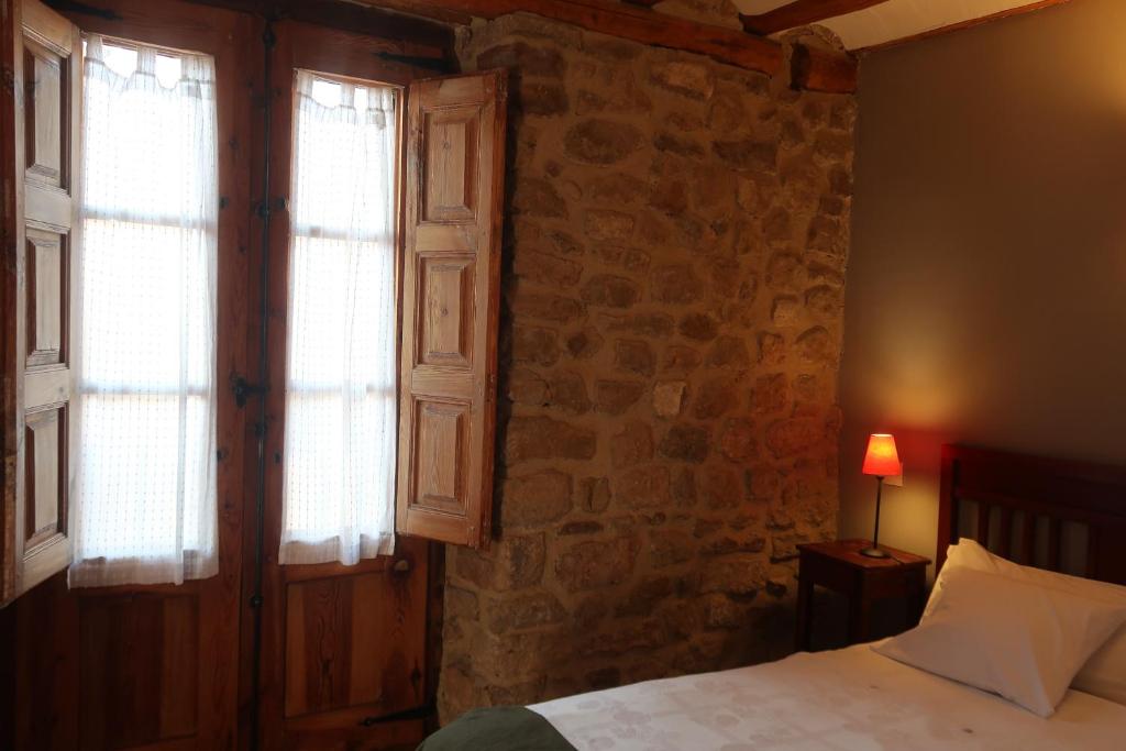 Postel nebo postele na pokoji v ubytování Casa Barría