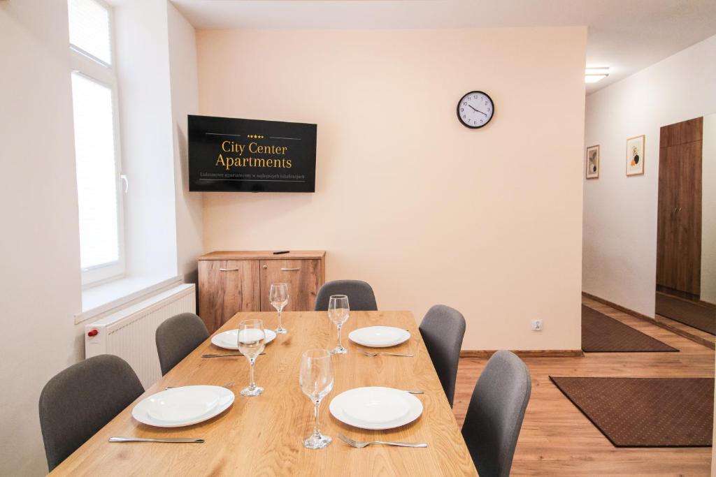 Televízia a/alebo spoločenská miestnosť v ubytovaní Apartament City Center Standard 6