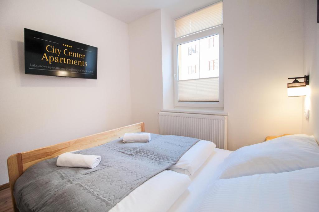 Posteľ alebo postele v izbe v ubytovaní Apartament City Center Standard 6