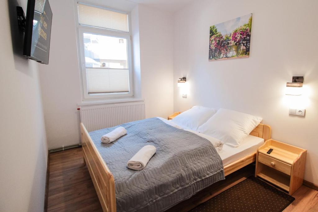 Posteľ alebo postele v izbe v ubytovaní Apartament City Center Standard 6