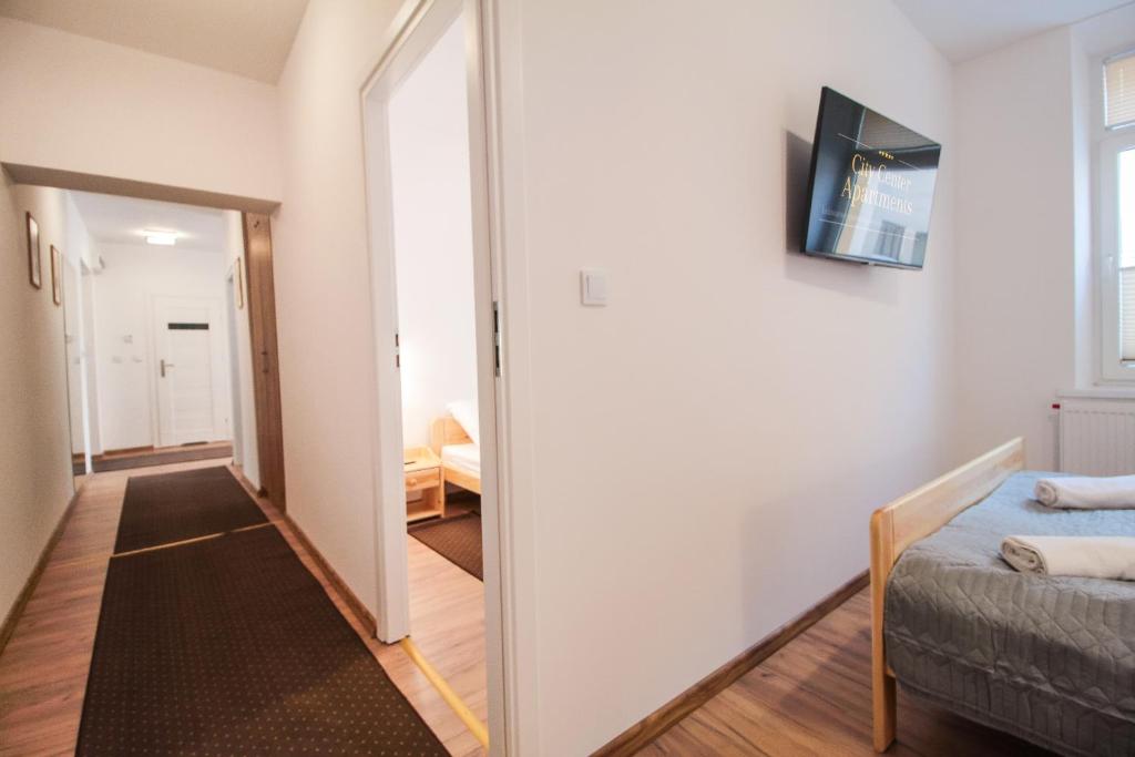 Posteľ alebo postele v izbe v ubytovaní Apartament City Center Standard 6