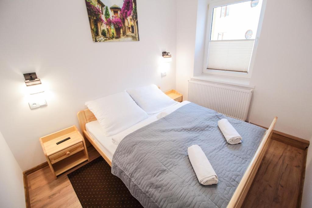 Posteľ alebo postele v izbe v ubytovaní Apartament City Center Standard 6