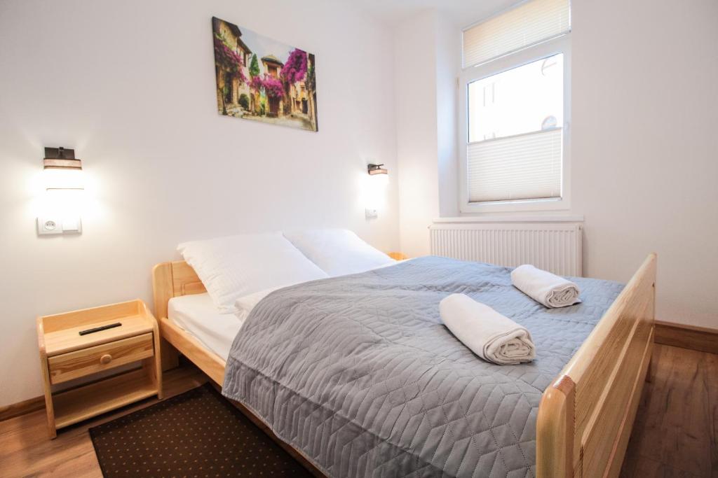 Posteľ alebo postele v izbe v ubytovaní Apartament City Center Standard 6