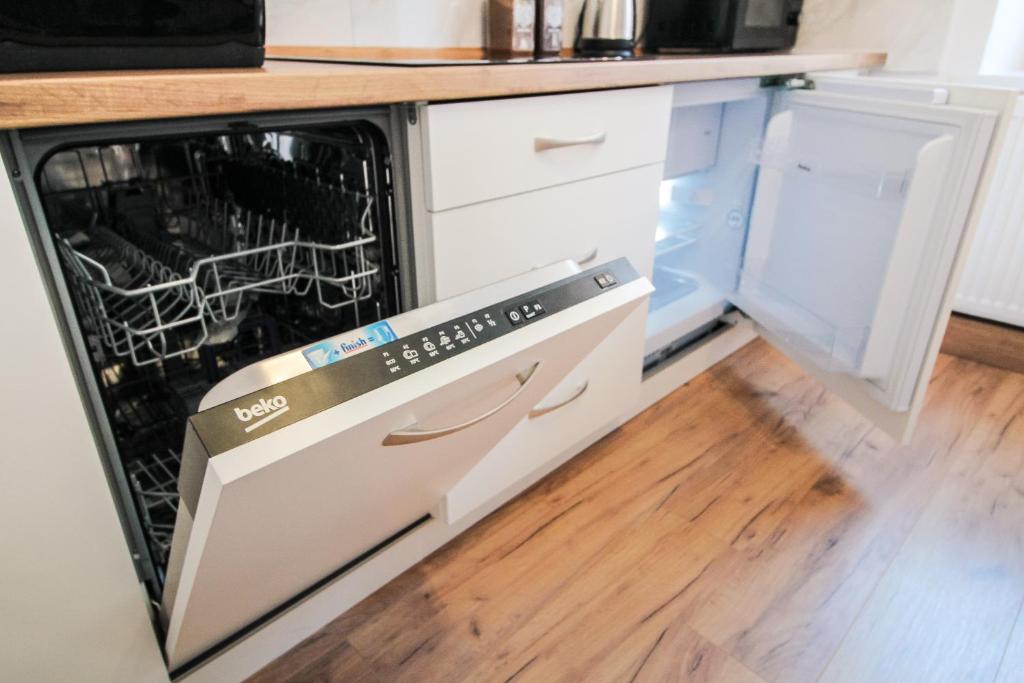 Kuchyňa alebo kuchynka v ubytovaní Apartament City Center Standard 6