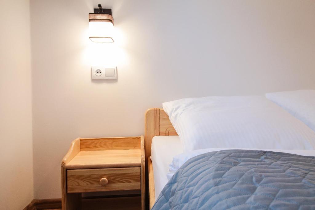 Posteľ alebo postele v izbe v ubytovaní Apartament City Center Standard 6