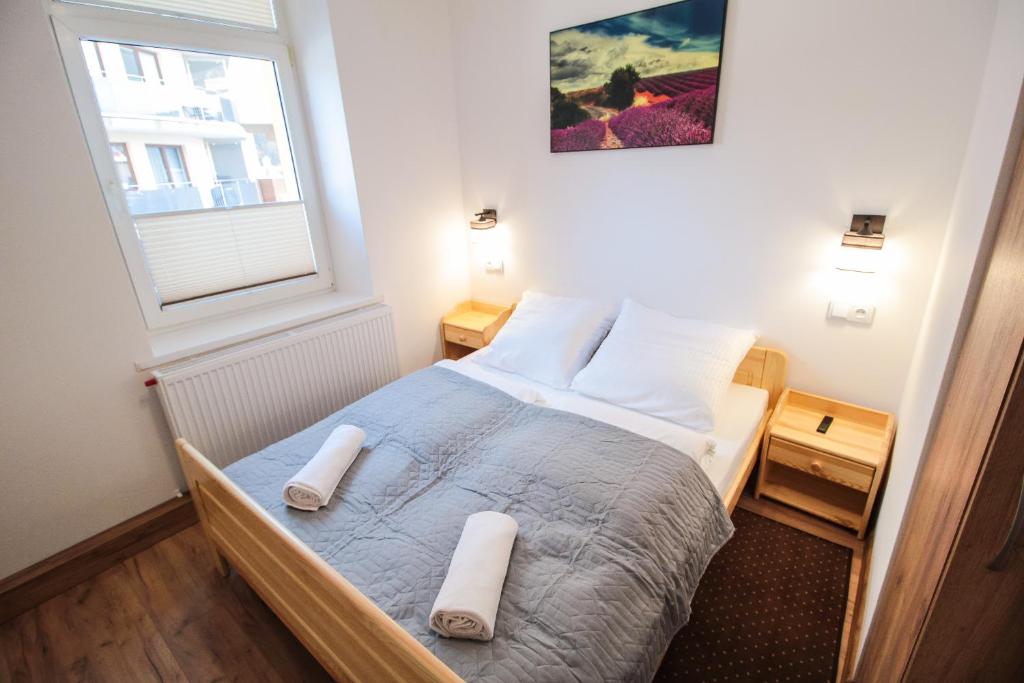 Posteľ alebo postele v izbe v ubytovaní Apartament City Center Standard 6