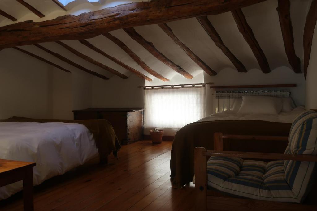 Postel nebo postele na pokoji v ubytování Casa Barría