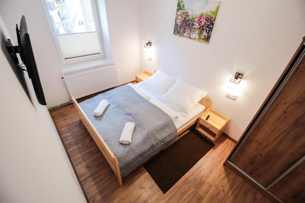 Posteľ alebo postele v izbe v ubytovaní Apartament City Center Standard 6