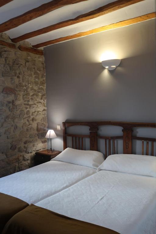Postel nebo postele na pokoji v ubytování Casa Barría