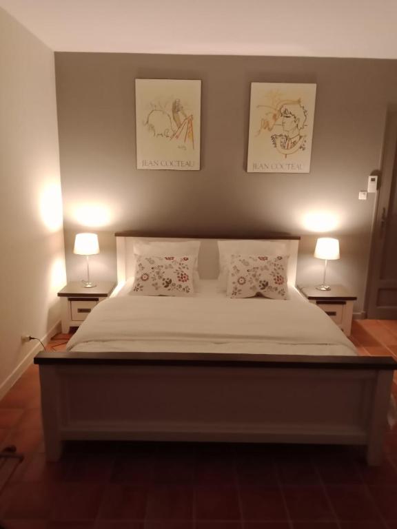 Postel nebo postele na pokoji v ubytování les Bartavelles