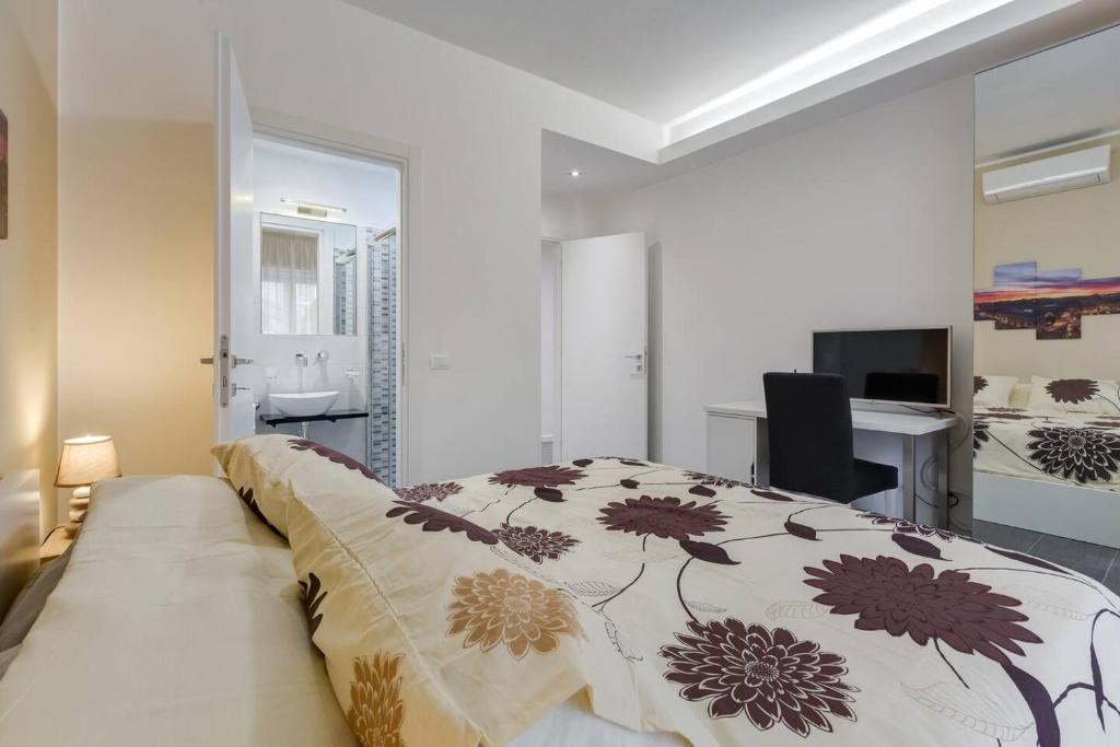 Łóżko lub łóżka w pokoju w obiekcie AV Domus Vatican St.Peter B&B