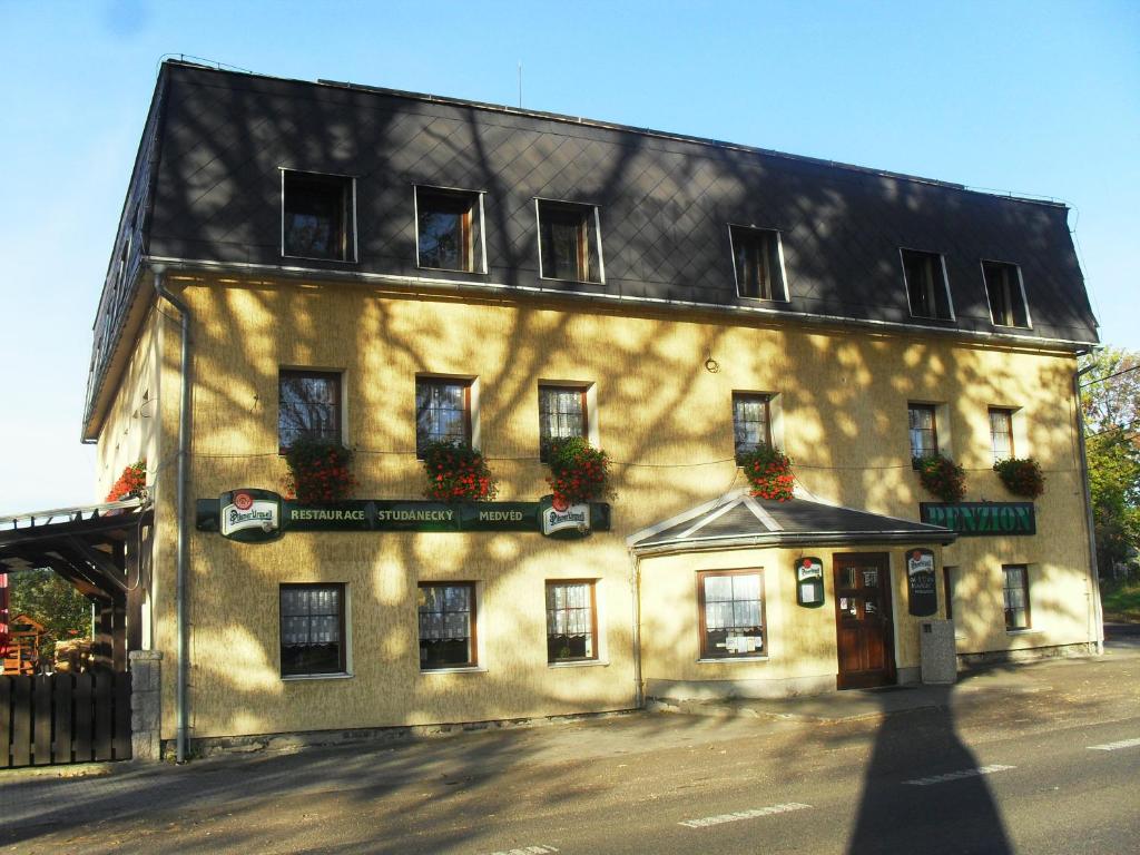 a large building on the side of a street at Studánecký Medvěd in Liberec