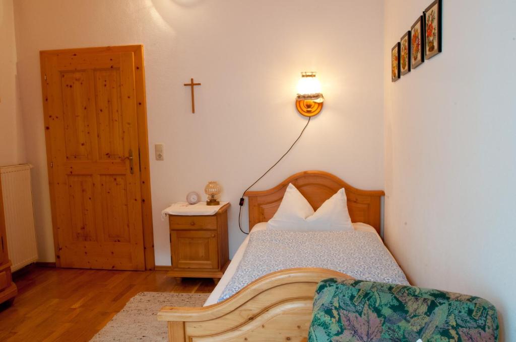 Postel nebo postele na pokoji v ubytování Hoderhof