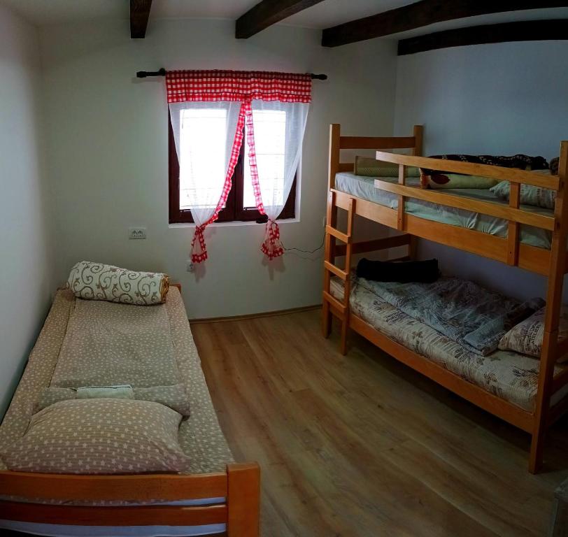 Postel nebo postele na pokoji v ubytování Etno kuća Ostrvica