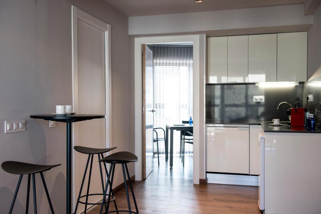 Kuchyň nebo kuchyňský kout v ubytování MH Apartments Urban