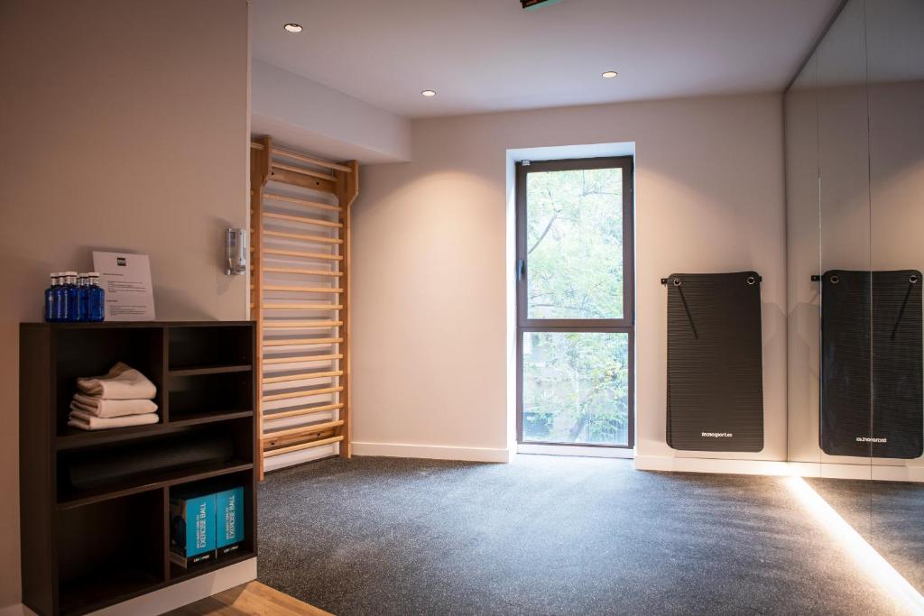 Kuchyň nebo kuchyňský kout v ubytování MH Apartments Urban