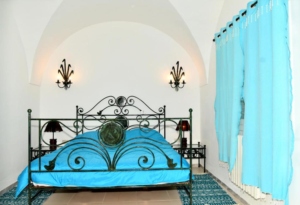Postel nebo postele na pokoji v ubytování BUNGALOW El HOUDA