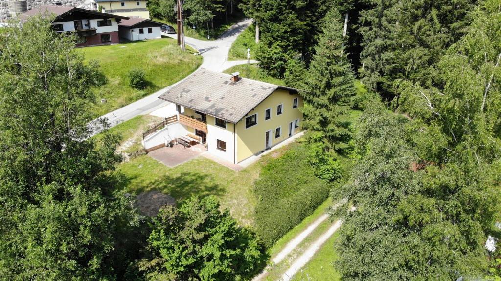 an aerial view of a house on a hill at Haus ter Stege in Annaberg im Lammertal