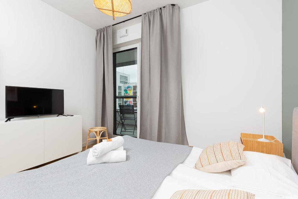 Posteľ alebo postele v izbe v ubytovaní Artistic Żoliborz Apartments by Noclegi Renters