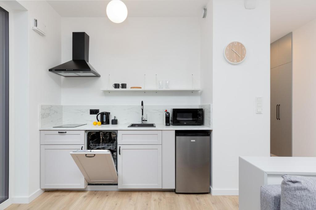 Kuchyňa alebo kuchynka v ubytovaní Artistic Żoliborz Apartments by Noclegi Renters