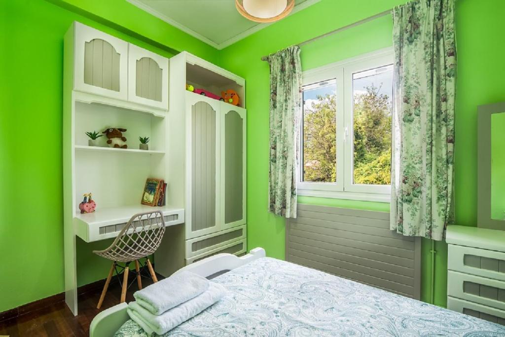 Posteľ alebo postele v izbe v ubytovaní Chara's House