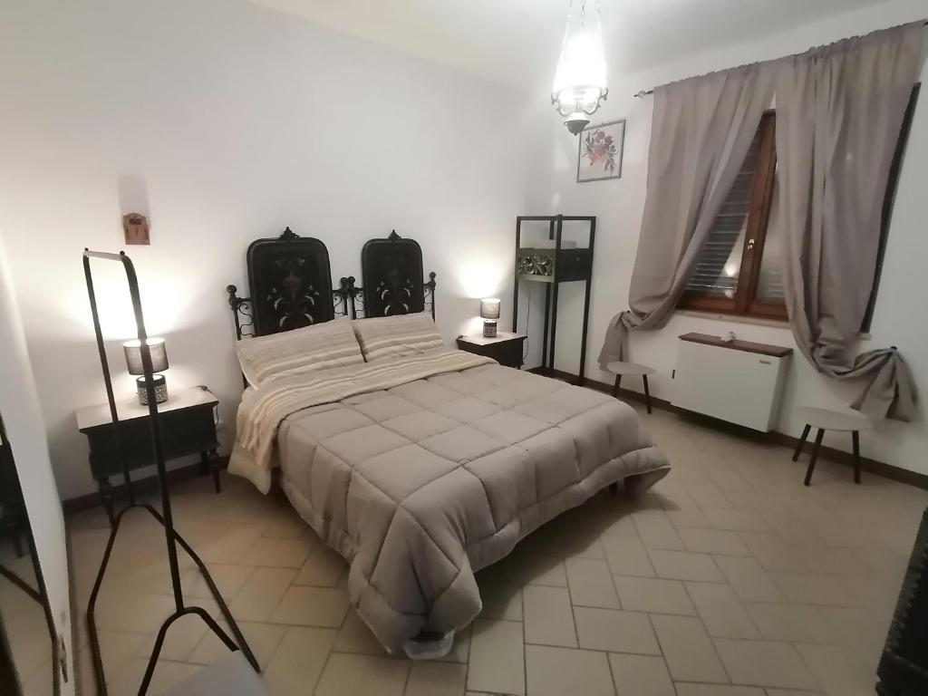 Łóżko lub łóżka w pokoju w obiekcie Residenza Schinardi
